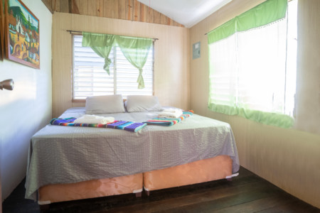 Bedroom with extra large double bed or 2 single beds in Casita villa