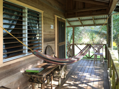 This family room features a private entrance on a large shared balcony overlooking the Maya Mountains and jungle.