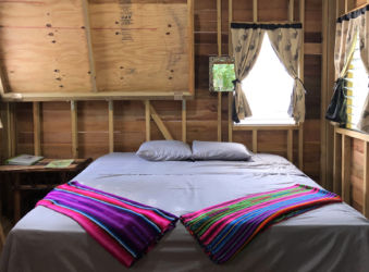 This studio room features a private entrance on a single balcony overlooking the Maya Mountains and jungle.