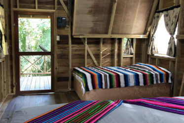 This studio room features a private entrance on a single balcony overlooking the Maya Mountains and jungle.